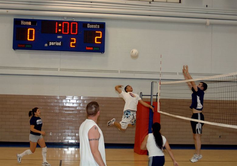 what score does olympic volleyball go to